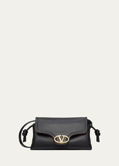 Valentino Garavani Mini Vlogo Drawstring Leather Shoulder Bag In Black