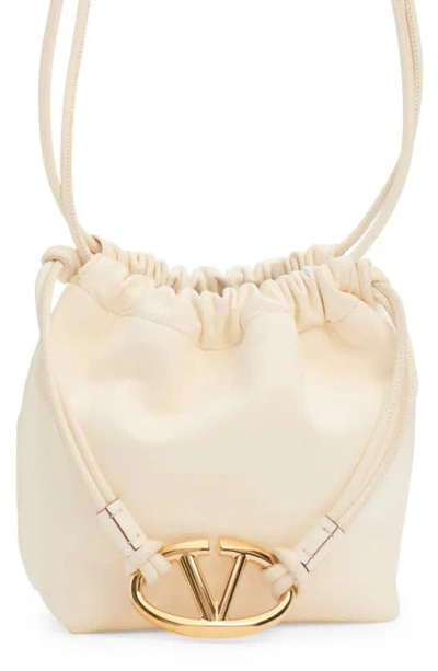 Valentino Garavani Mini Vlogo Leather Drawstring Bag In Off-white