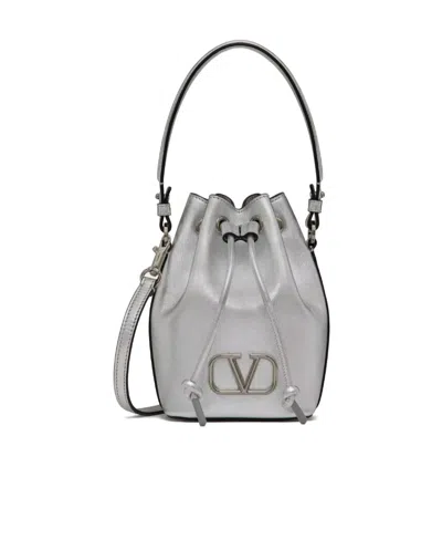 Valentino Garavani Mini Vlogo Signature Metallic Bucket Bag In Grey