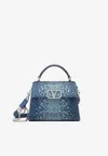 Valentino Mini Vsling Denim Top Handle Bag With Rhinestone Embellishments In Blue
