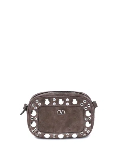 Valentino Garavani Dome-shaped Crossbody Bag With Metallic Eyelets And Adjustable Strap In Brown