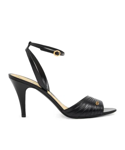 Valentino Garavani Rockstud Ankle-strap Flat Sandals In Black