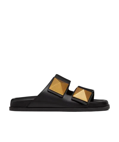 Valentino Garavani Oversized Rockstud Flat Sandals In Black