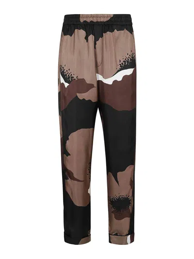 VALENTINO TWILL  TROUSERS WITH  FLOWER PORTRAIT PRINT