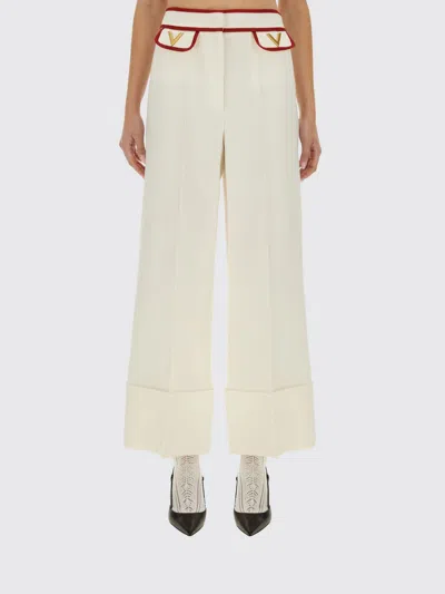 Valentino Ivory Trousers With Gold V In Neutral