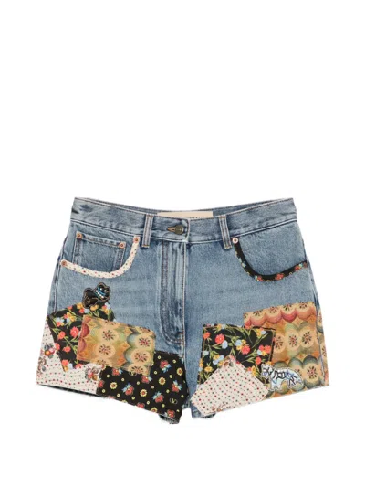 VALENTINO PATCHWORK BEADED-APPLIQUÉ DENIM SHORTS