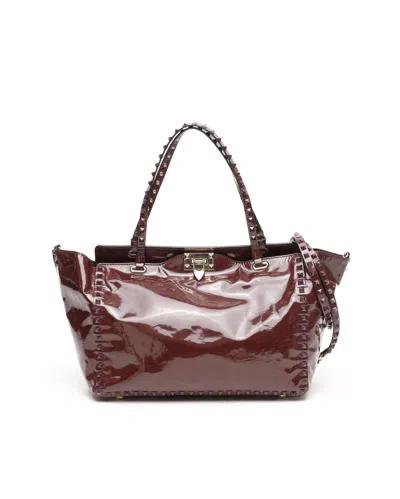 Valentino Garavani Valentino Patent Rockstud Trapeze Tote Bag In Burgundy