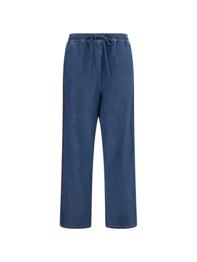 Valentino Piped-trim Vlogo Jeans In Blue
