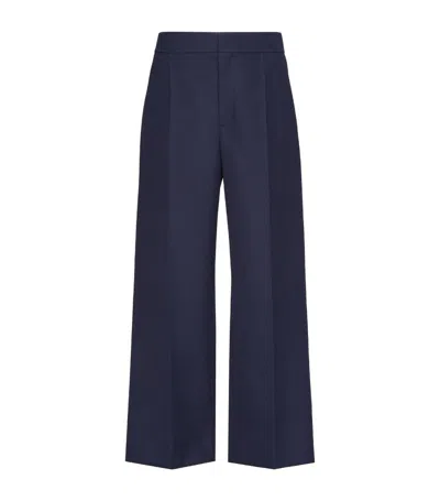 Valentino Pleated Flared Tailored Trousers In Blue