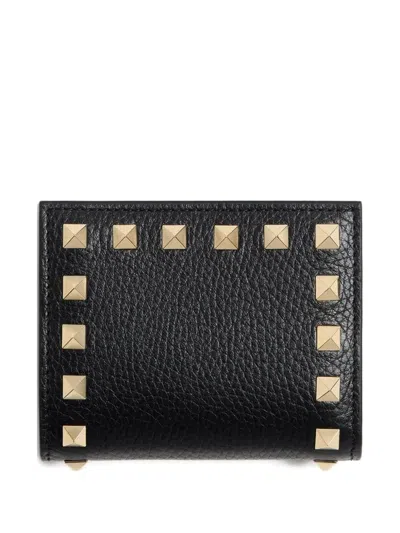 Valentino Garavani Rockstud Flap Wallet In Burgundy Leather In Black