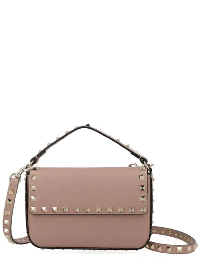 Valentino Garavani Pouch Rockstud In Vitello Granato In Pink
