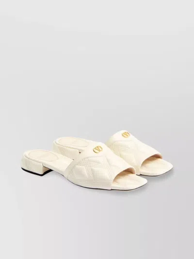 Valentino Garavani Quilted Leather Backless Flat Sandals In White
