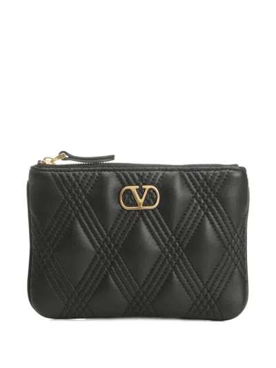 Valentino Garavani Quilted Logo Clutch In Black