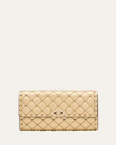 Valentino Garavani Quilted Rockstud Metallic Leather Shoulder Bag In Brown