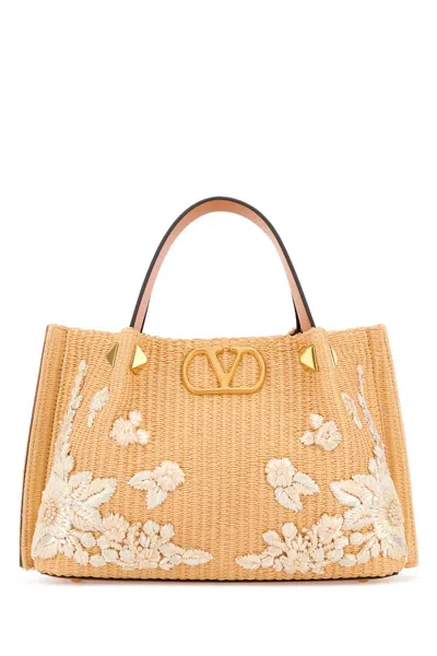 Valentino Garavani Raffia Vlogo Signature Bucket Bag In Orange