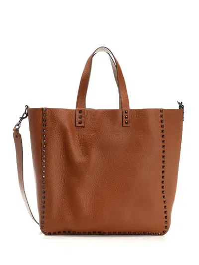 Valentino Garavani Reversible Rockstud Shopper In Brown