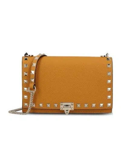 Valentino Garavani Rivet Shoulder Bag In Orange