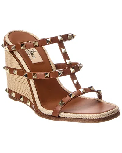 Valentino Garavani Valentino Rockstud 100 Leather Wedge Sandal In Brown