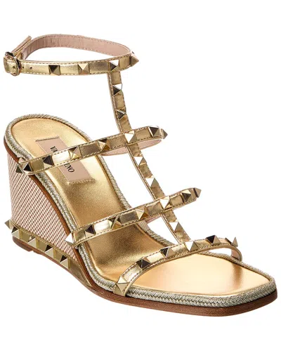 Valentino Garavani Valentino Rockstud Leather Sandal In Gold