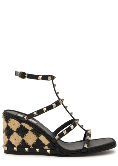 Valentino Garavani Valentino Rockstud 90 Leather And Raffia Wedge Sandals In Black
