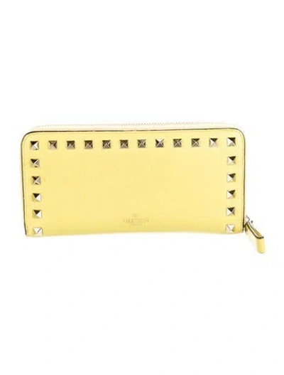 Pre-owned Valentino Garavani Rockstud Accents Leather Continental Wallet In Yellow