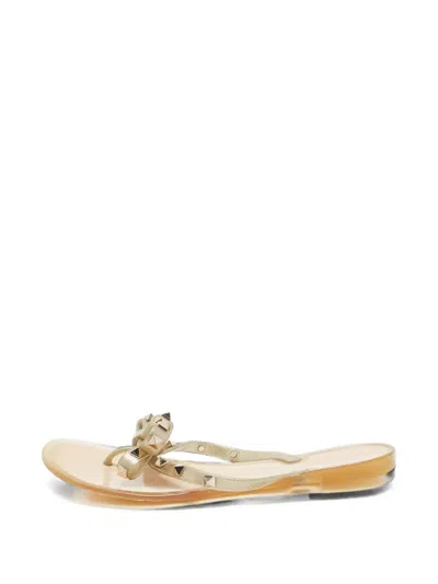 Pre-owned Valentino Garavani Rockstud Bow Slides In Gold