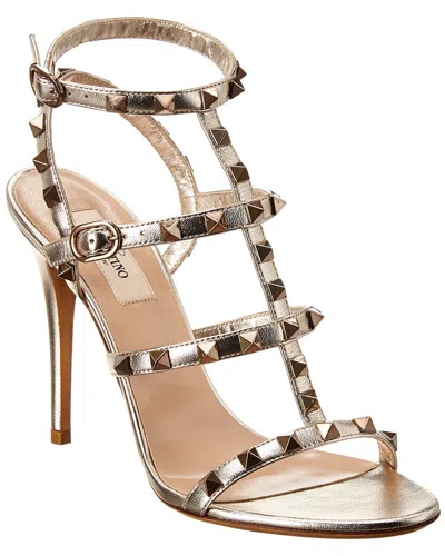 Valentino Garavani Valentino Rockstud Caged 100 Metallic Leather Sandal In Gold