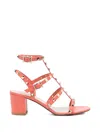 Valentino Garavani Rockstud Caged Sandals In Orange