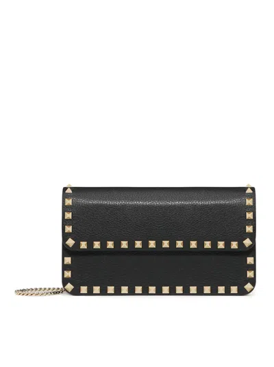 Valentino Garavani Rockstud Chain Pouch In Garnet Calfskin In Black