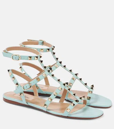Valentino Garavani Rockstud Flat Leather Sandals In Blue
