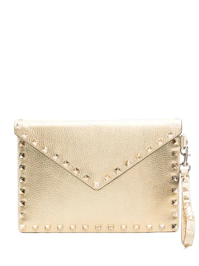 Valentino Garavani Rockstud Clutch Bag In Gold