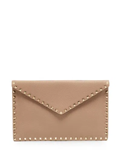 Valentino Garavani Rockstud Clutch Bag In Pink
