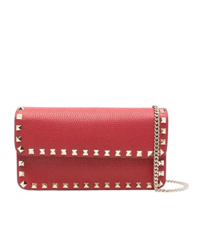 Valentino Garavani Rockstud Clutch Bag In Red