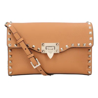 Valentino Garavani Valentino Rockstud Crossbody Bag In Brown