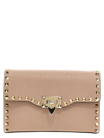 Valentino Garavani Rockstud Crossbody Bags Pink In Neutral