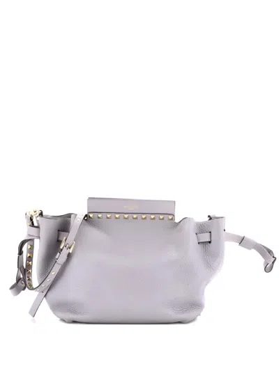 Pre-owned Valentino Garavani Rockstud Drawstring Leather Small Crossbody Bag In Blue