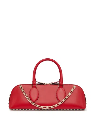 Valentino Garavani Duffle Rockstud Red Calf Leather Handbag In Rouge Pur