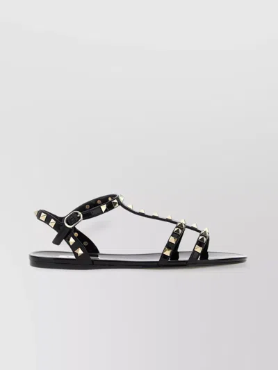Valentino Garavani Rockstud Flat Sole Open Toe Sandals In Black