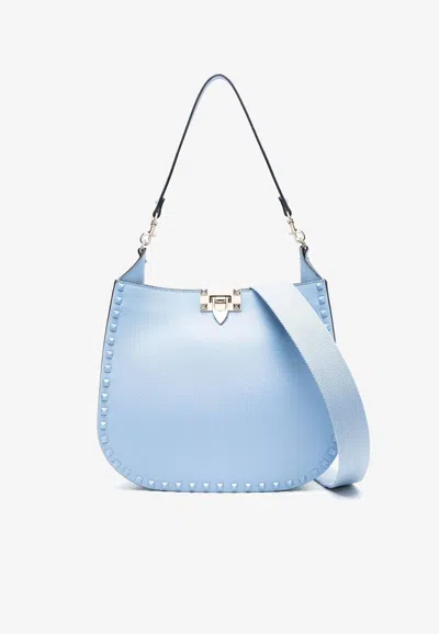 Valentino Garavani Rockstud Grained Leather Hobo Bag In Light Blue