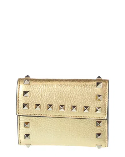 Valentino Garavani Valentino Rockstud Grainy Leather Trifold Wallet In Gold