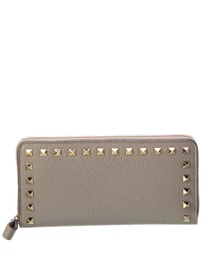 Valentino Garavani Valentino Rockstud Grainy Leather Zip Around Wallet In Brown