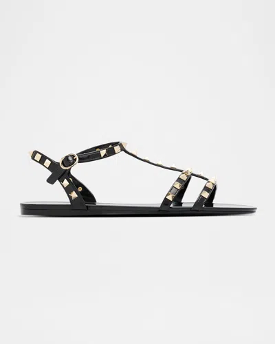 Valentino Garavani Rockstud Jelly Flat Gladiator Sandals In Black