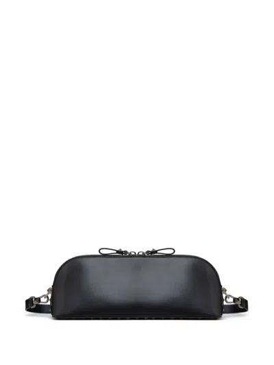 Valentino Garavani Rockstud Leather Clutch Bag In Black