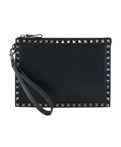 Valentino Garavani Rockstud Leather Clutch Bag In Black