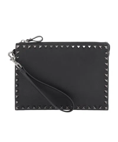 Valentino Garavani Rockstud Leather Clutch Bag In Black