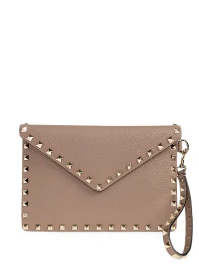 Valentino Garavani Rockstud Leather Clutch Bag In Brown