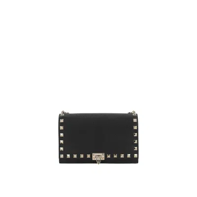 Valentino Garavani Rockstud Leather Clutch In Black