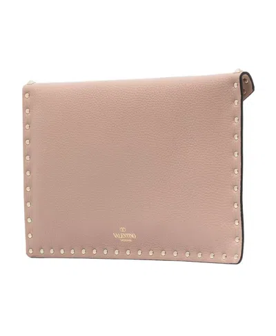Valentino Garavani Rockstud Leather Clutch In Pink