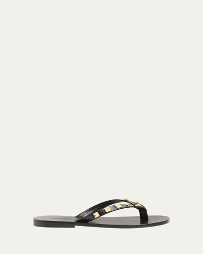 Valentino Garavani Rockstud Leather Flat Thong Sandals In Black
