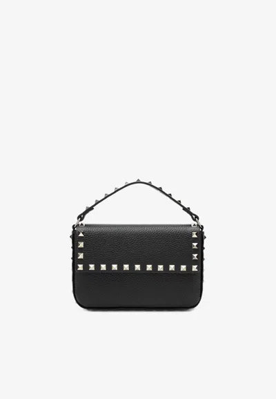 Valentino Garavani Rockstud Leather Pouch Bag In Black